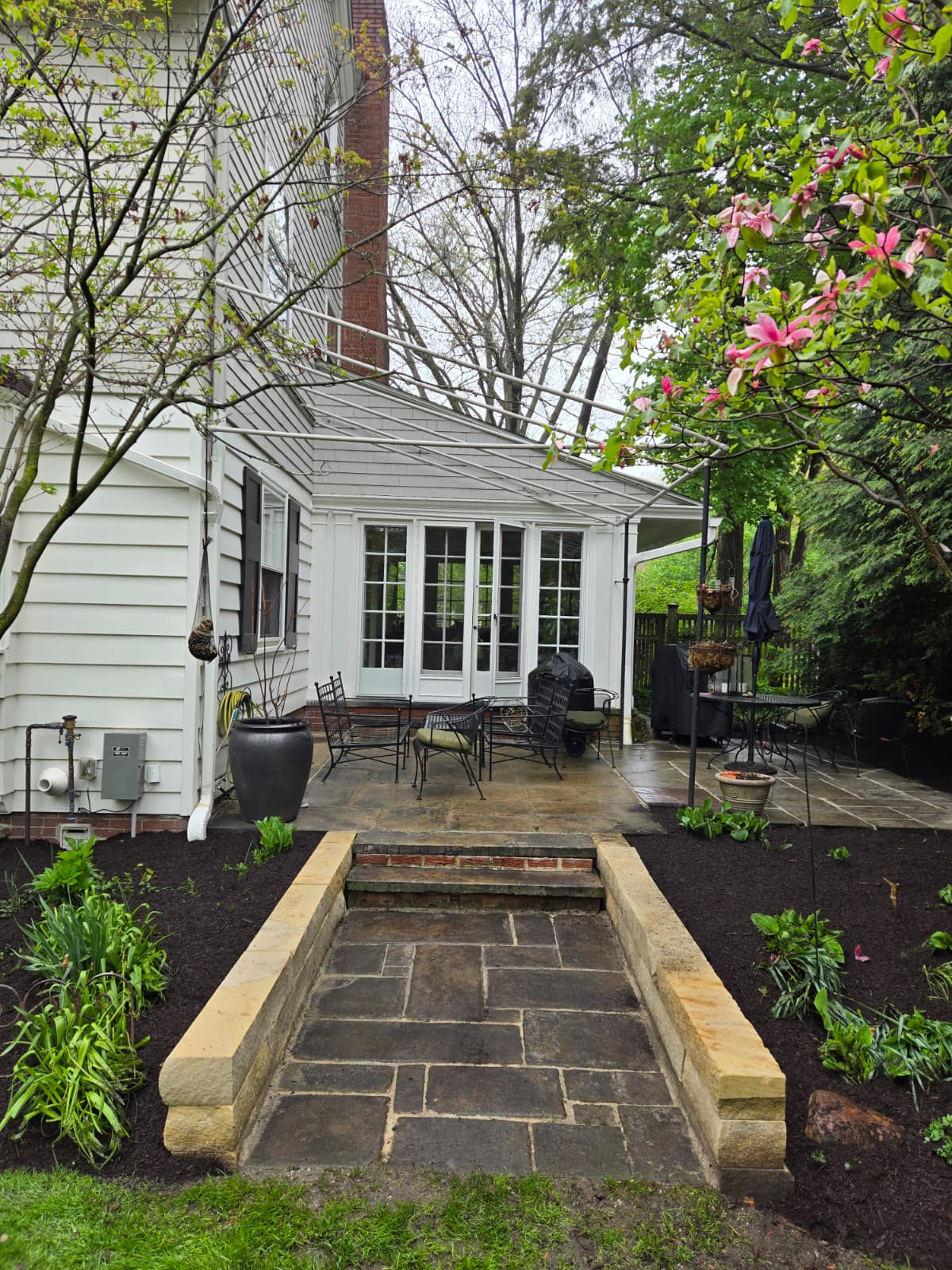 Completed patio with mulch landscaping